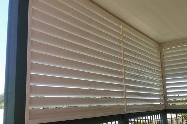 Aluminium Louvres in balcony Adjutable Aluminium Louvres installed over the railings in the balcony